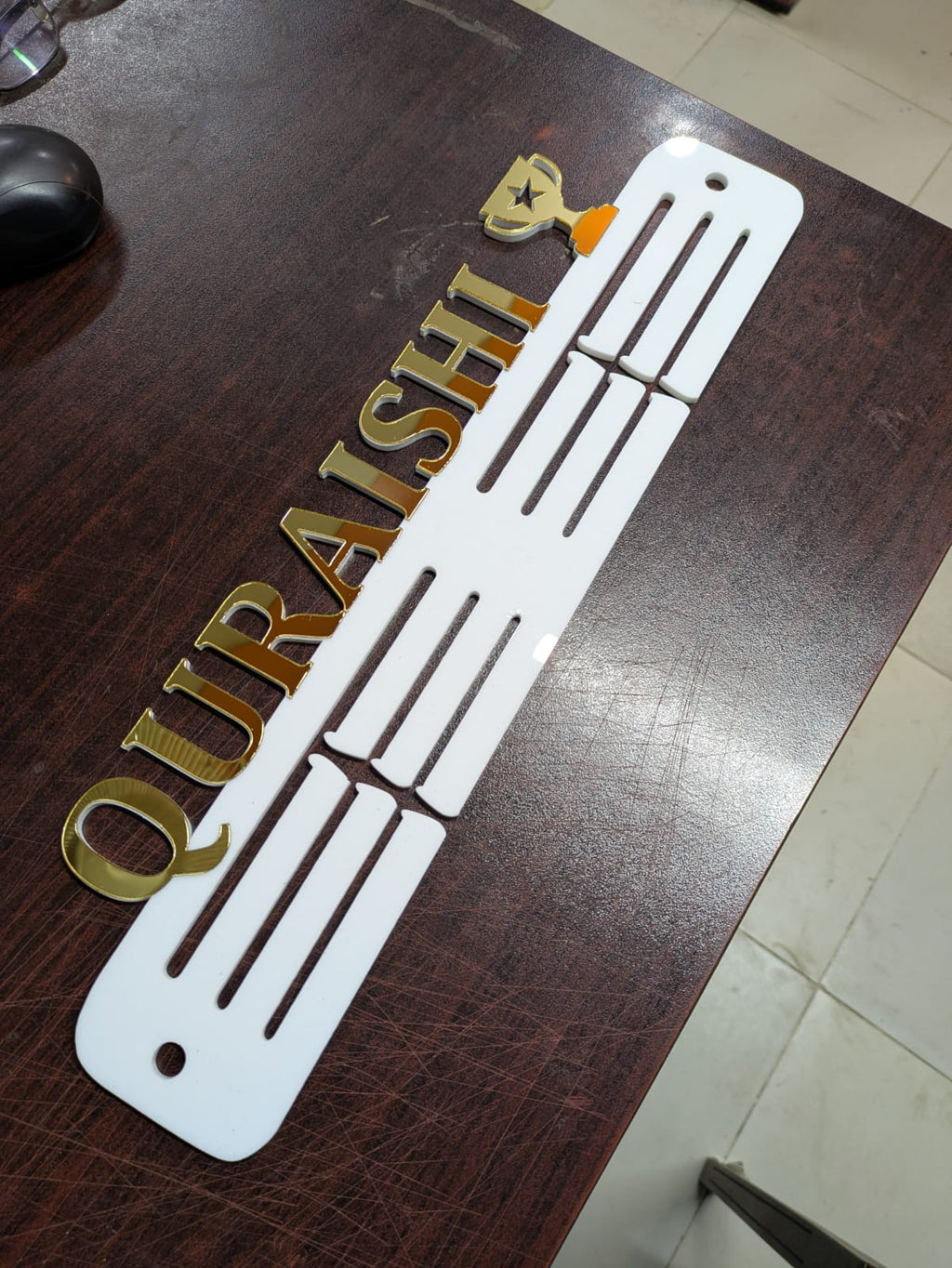 Custom medal hanger acrylic black finish